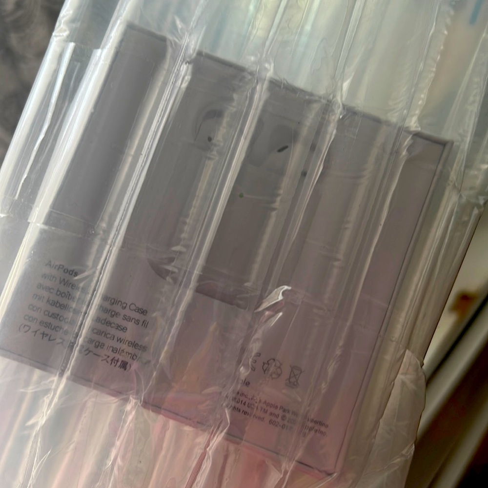 Brand new AirPods, never opened.
